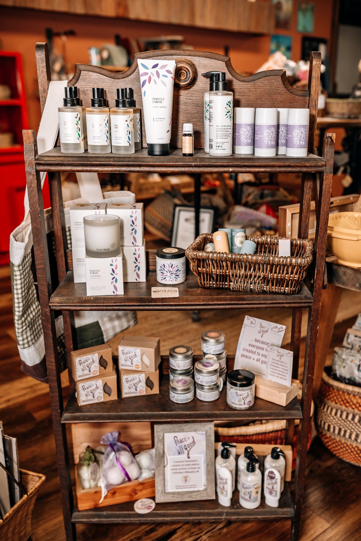 Thistle Farms and Franciscan Peacemakers body care and candles displayed at Yada in Middleton, Wisconsin